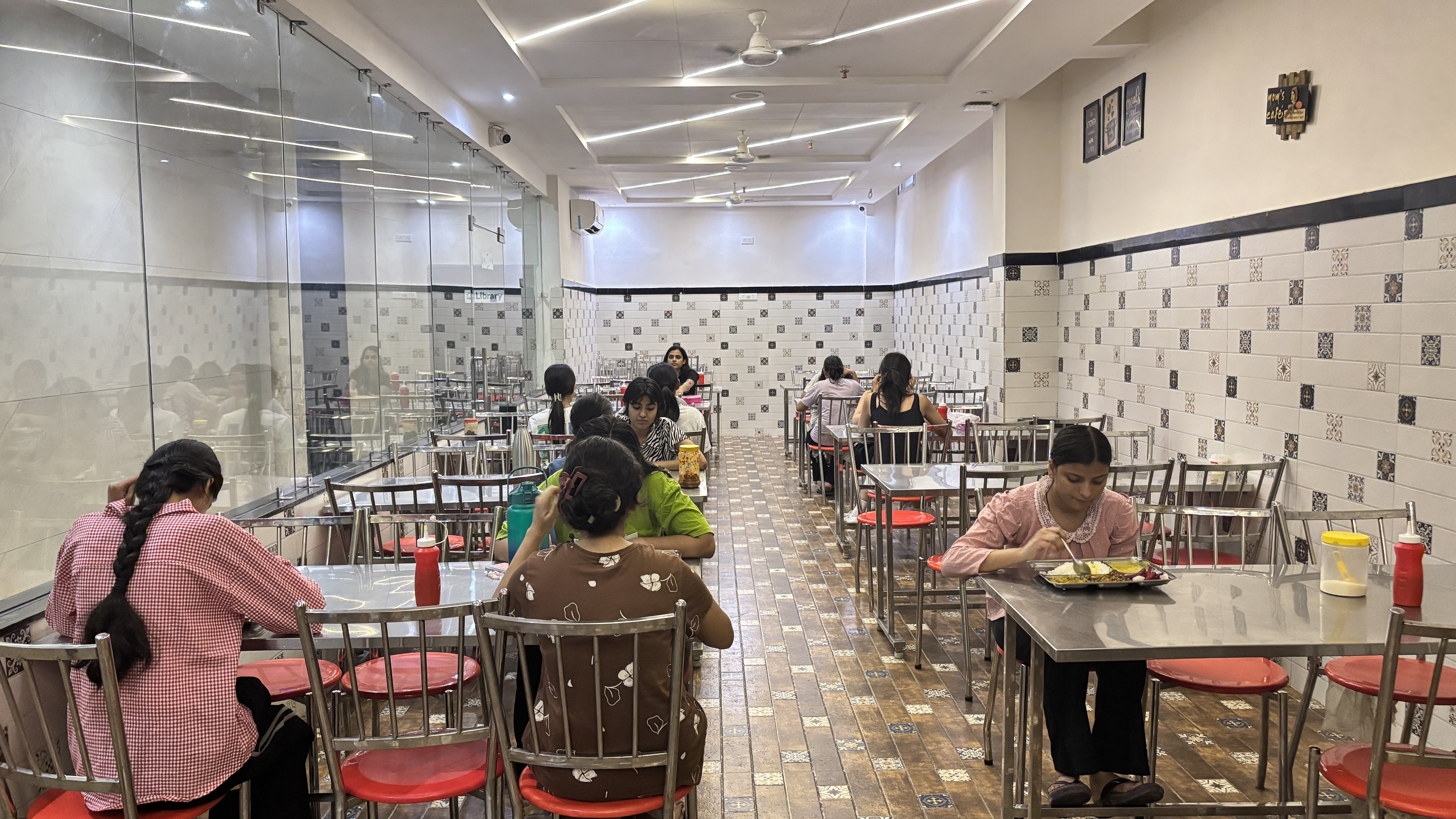 Students enjoying home-style meals in the Maya Residency mess