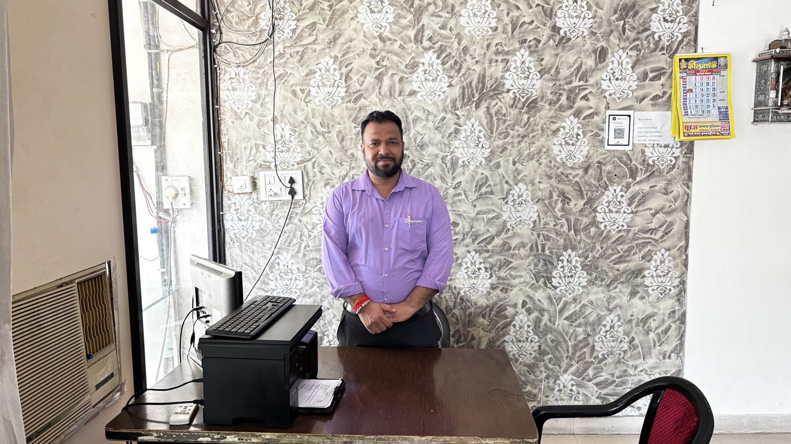 Male reception staff at the Maya Residency Rajiv Gandhi Nagar front desk