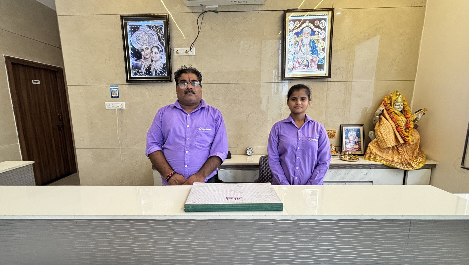 Maya Residency reception team at the front desk