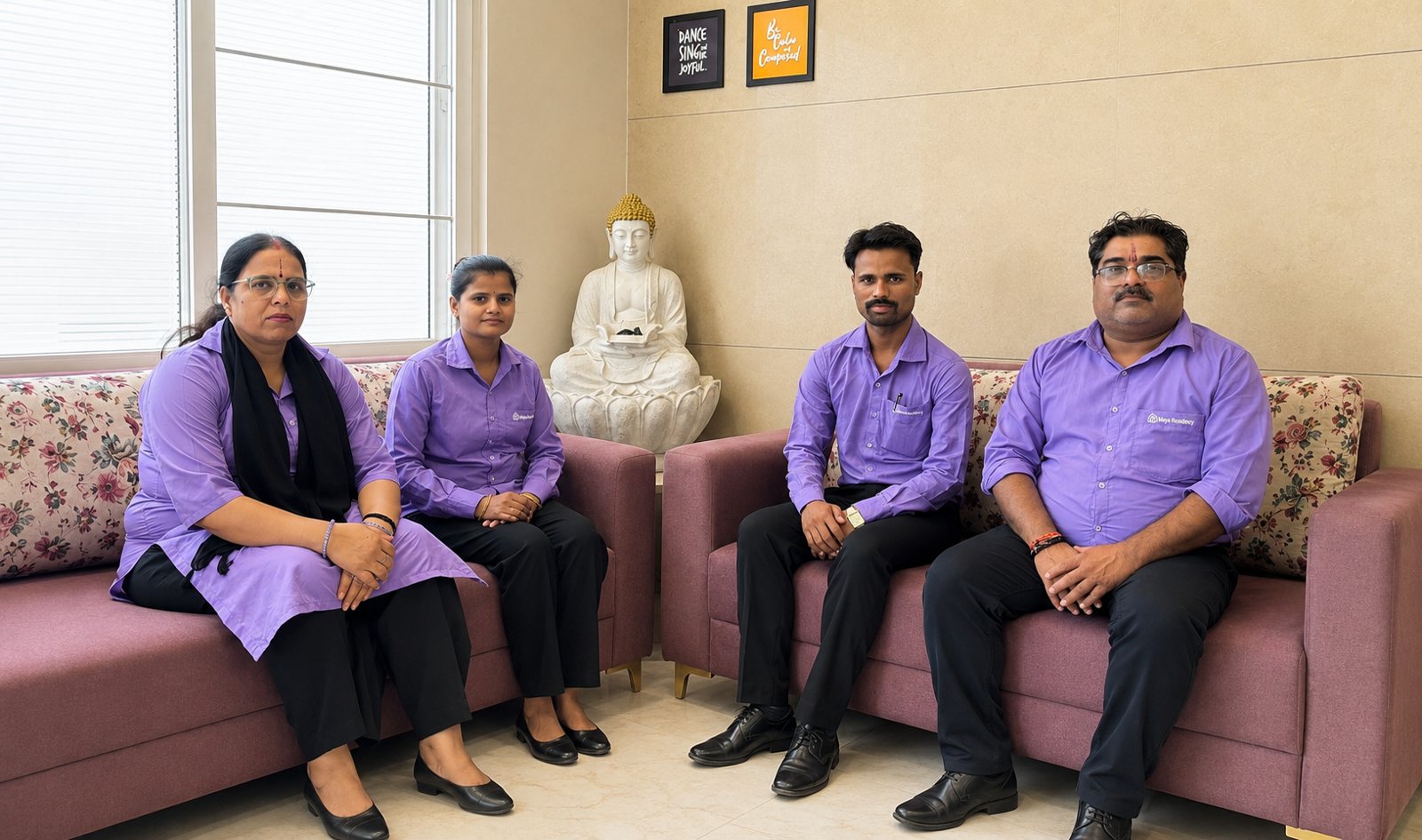 Maya Residency staff team in the lounge